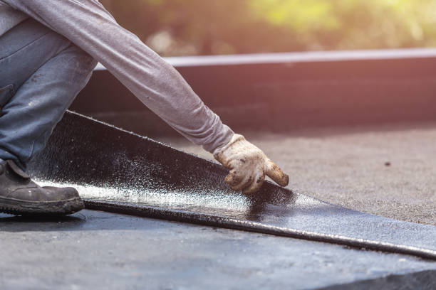 Professional Waterproofing technician working in Talladega, AL